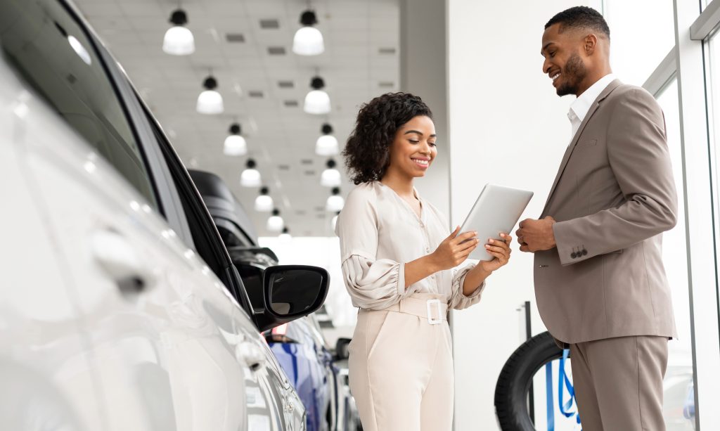 A car buyer evaluating if they can purchase the vehicle