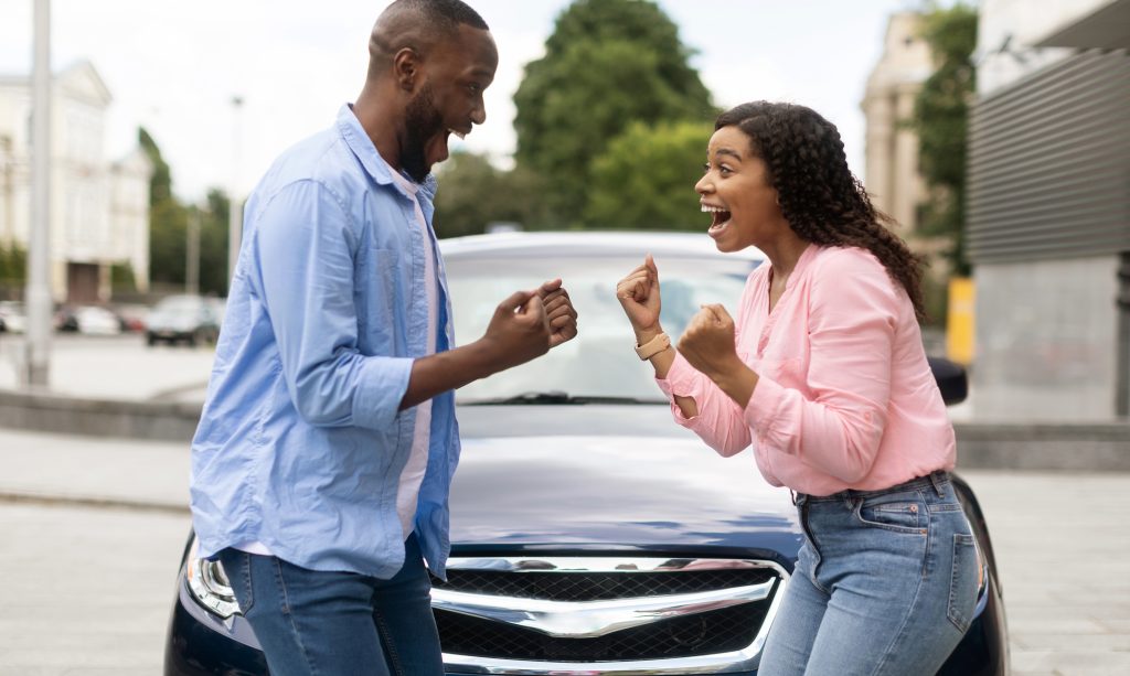 A couple getting approval for a car